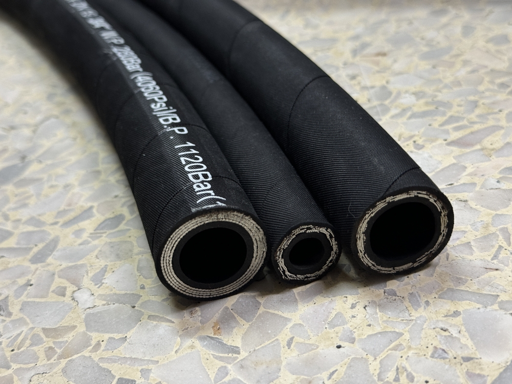 Three,Clean,Cut,Hydraulic,Hose,Of,Different,Sizes,Laying,Next
